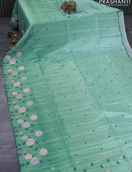 Crush tissue saree teal green with embroidery work buttas and floral embroidery cut work border