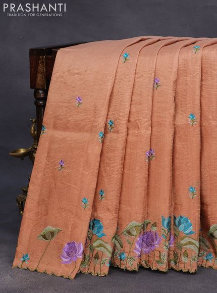 Crush tissue saree rust shade with embroidery work buttas and floral embroidery work border