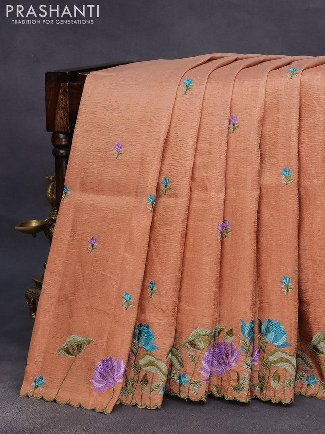 Crush tissue saree rust shade with embroidery work buttas and floral embroidery work border