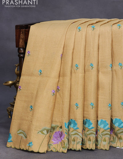 Crush tissue saree beige and elaichi green shade with embroidery work buttas and floral embroidery work border