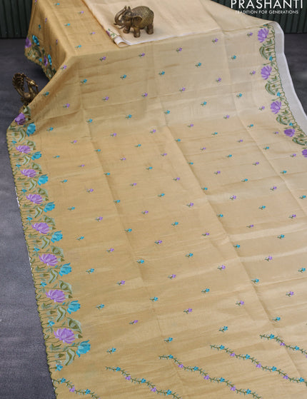 Crush tissue saree beige and elaichi green shade with embroidery work buttas and floral embroidery work border