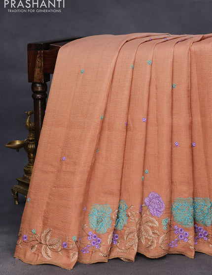 Crush tissue saree rust shade with embroidery work buttas and floral embroidery work border