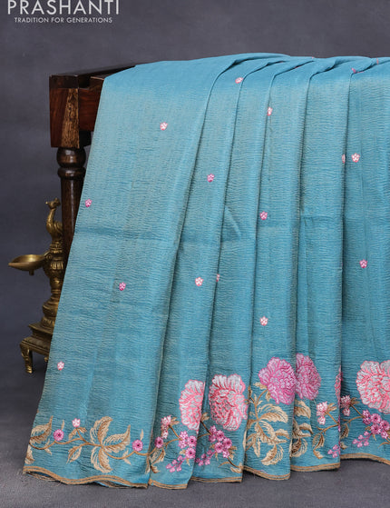 Crush tissue saree teal blue with embroidery work buttas and floral embroidery work border