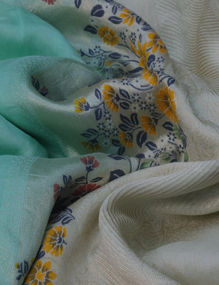 Raw silk saree pastel blue and cream with floral prints & zari buttas and zari woven floral paithani border