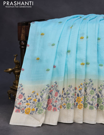 Raw silk saree pastel blue and cream with floral prints & zari buttas and zari woven floral paithani border