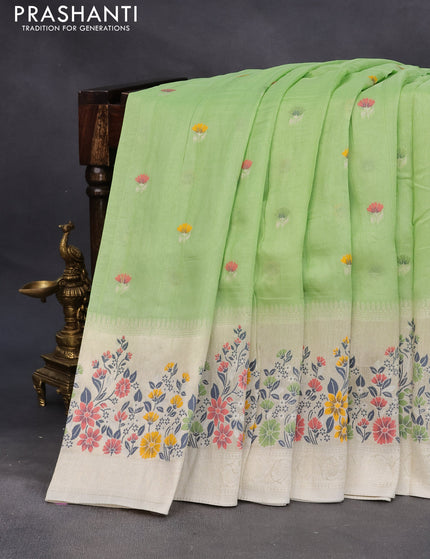 Raw silk saree light green and cream with floral prints & zari buttas and zari woven floral paithani border