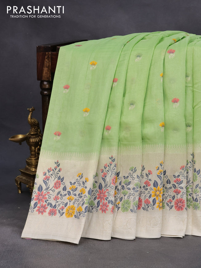 Raw silk saree light green and cream with floral prints & zari buttas and zari woven floral paithani border