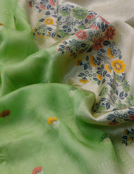 Raw silk saree light green and cream with floral prints & zari buttas and zari woven floral paithani border