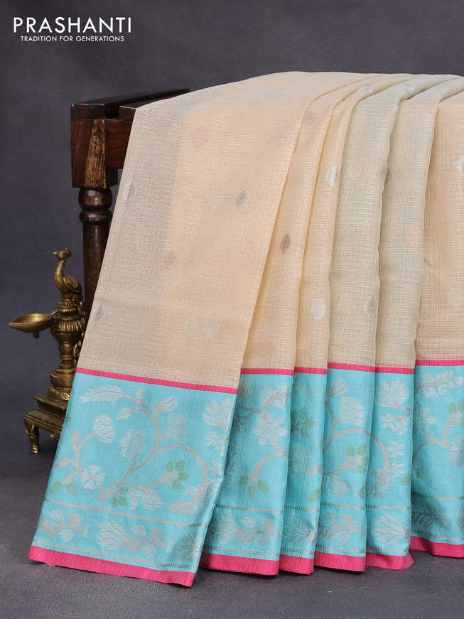 Zari kota saree cream and teal blue with allover gold & silver zari woven buttas and zari woven floral border