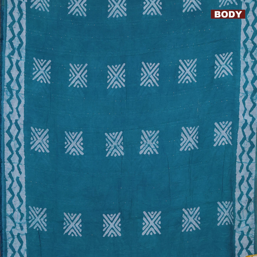 Batik cotton saree teal blue with allover sequin work & batik butta prints and printed lace work border