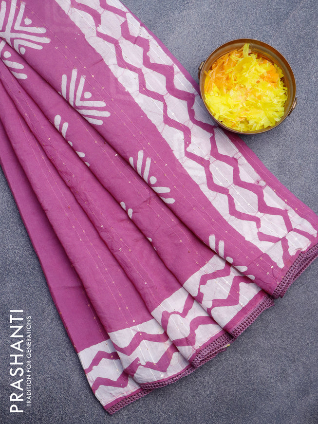 Batik cotton saree mauve pink with allover sequin work & batik butta prints and printed lace work border