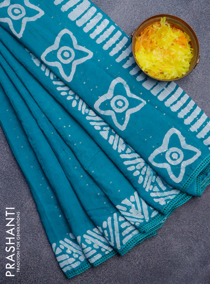 Batik cotton saree teal shade with allover sequin work & batik butta prints and printed lace work border