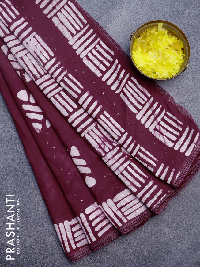 Batik cotton saree wine shade with allover sequin work & batik butta prints and printed lace work border