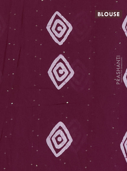 Batik cotton saree wine shade with allover sequin work & batik butta prints and printed lace work border