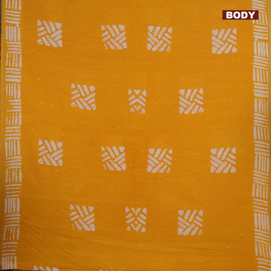 Batik cotton saree yellow with allover sequin work & batik butta prints and printed lace work border