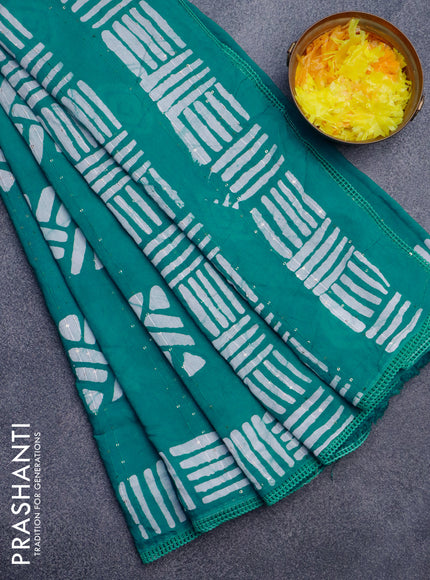 Batik cotton saree teal green with allover sequin work & batik butta prints and printed lace work border