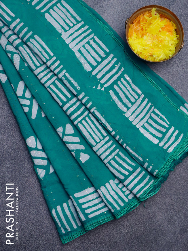 Batik cotton saree teal green with allover sequin work & batik butta prints and printed lace work border