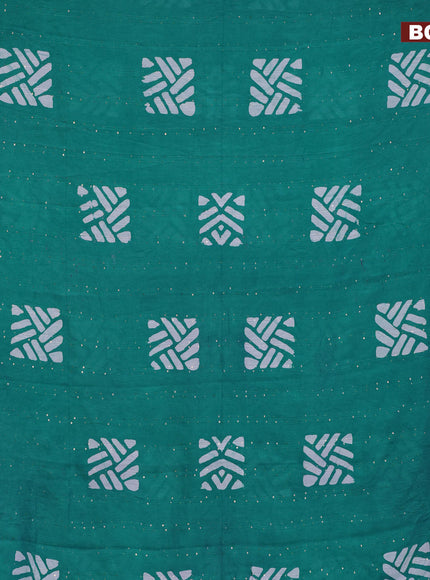 Batik cotton saree teal green with allover sequin work & batik butta prints and printed lace work border