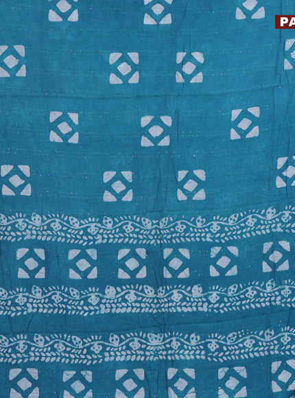 Batik cotton saree teal blue with allover sequin work & batik butta prints and printed lace work border