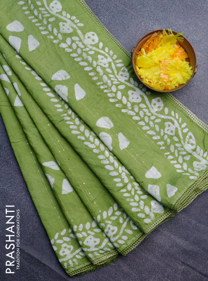 Batik cotton saree light green with allover sequin work & batik butta prints and printed lace work border