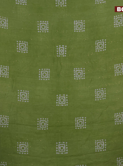 Batik cotton saree light green with allover sequin work & batik butta prints and printed lace work border