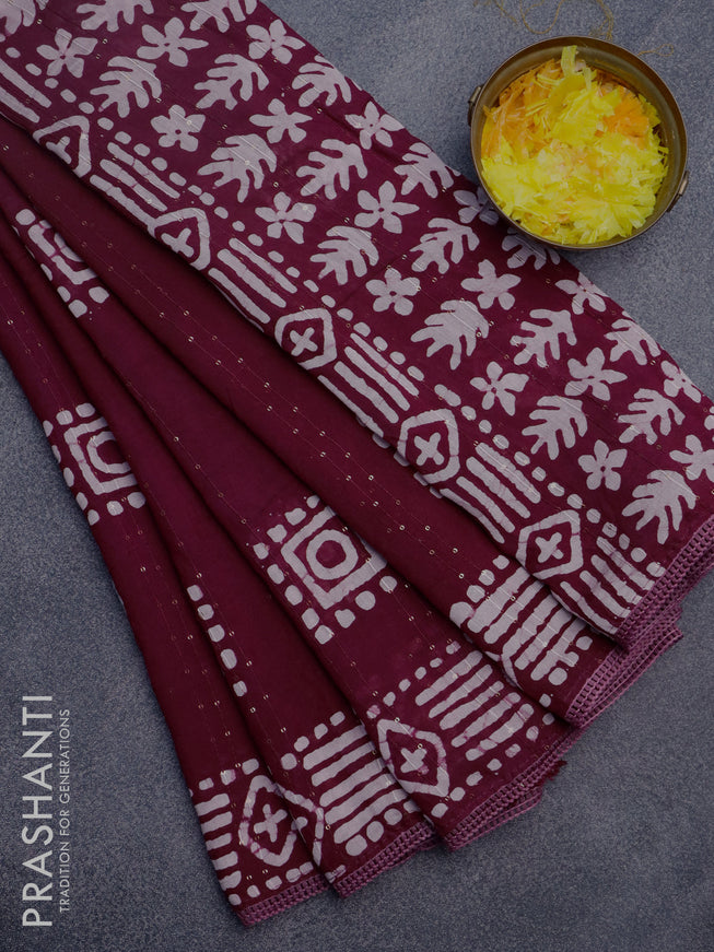 Batik cotton saree wine shade with allover sequin work & batik butta prints and printed lace work border