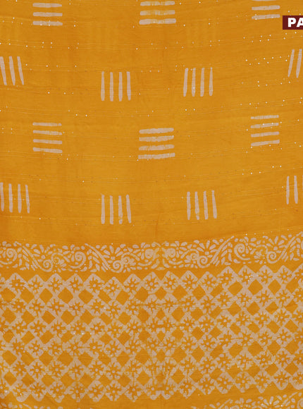 Batik cotton saree yellow with allover sequin work & batik butta prints and printed lace work border