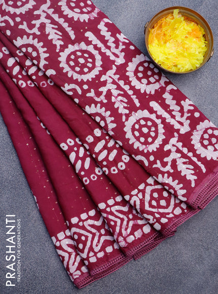 Batik cotton saree wine shade with allover sequin work & batik butta prints and printed lace work border