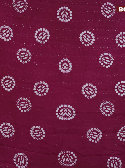 Batik cotton saree wine shade with allover sequin work & batik butta prints and printed lace work border