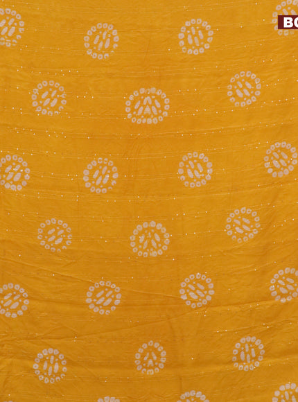 Batik cotton saree yellow with allover sequin work & batik butta prints and printed lace work border