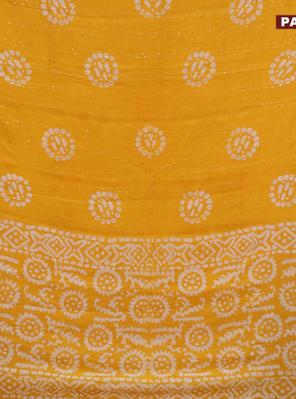 Batik cotton saree yellow with allover sequin work & batik butta prints and printed lace work border