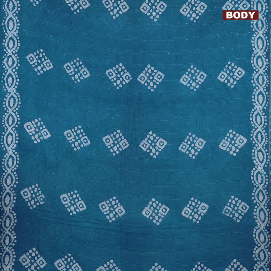 Batik cotton saree teal blue with allover sequin work & batik butta prints and printed lace work border