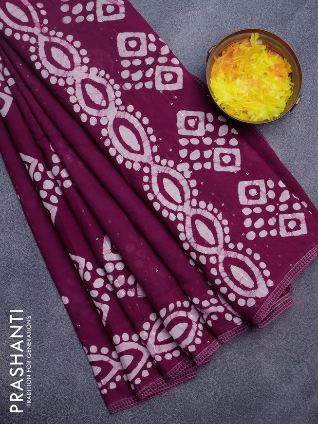 Batik cotton saree wine shade with allover sequin work & batik butta prints and printed lace work border