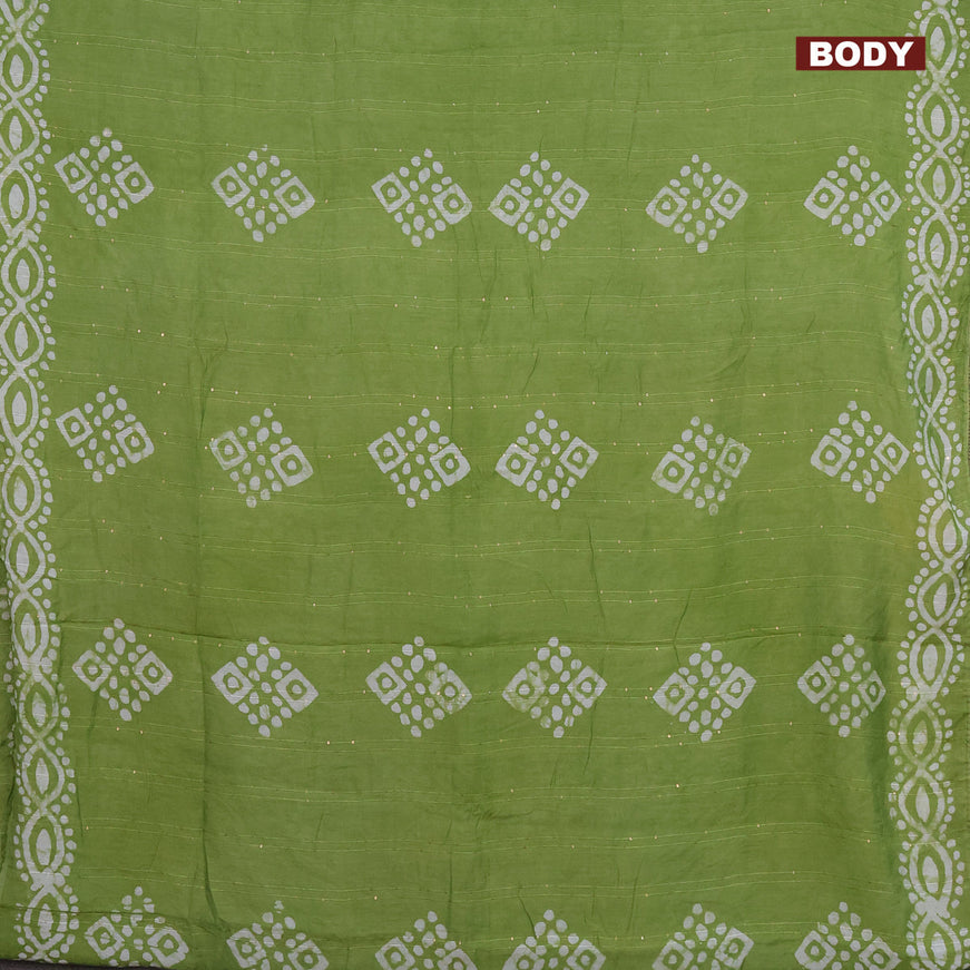 Batik cotton saree light green with allover sequin work & batik butta prints and printed lace work border