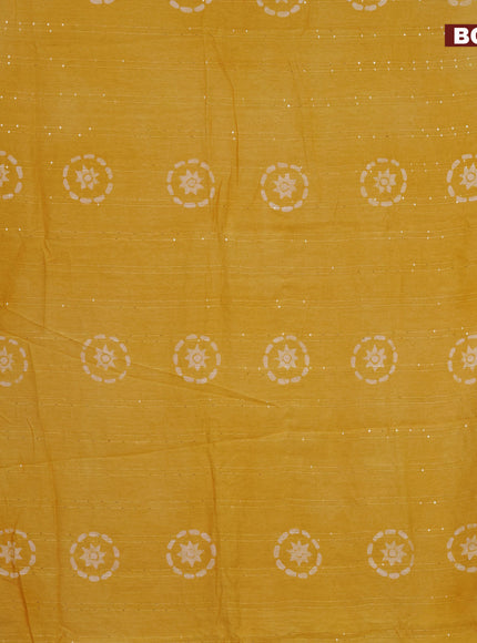 Batik cotton saree yellow with allover sequin work & batik butta prints and printed lace work border