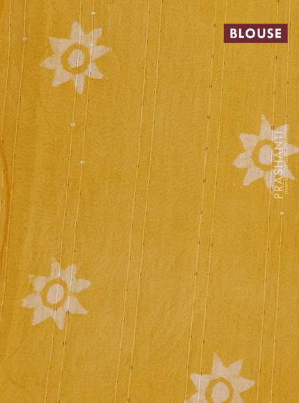 Batik cotton saree yellow with allover sequin work & batik butta prints and printed lace work border