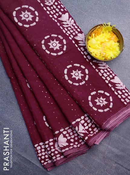 Batik cotton saree wine shade with allover sequin work & batik butta prints and printed lace work border