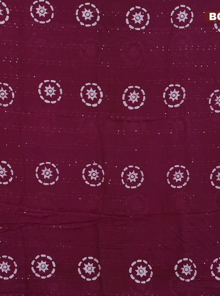 Batik cotton saree wine shade with allover sequin work & batik butta prints and printed lace work border