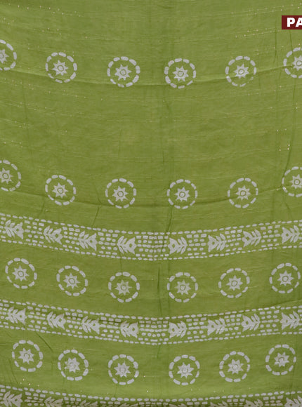 Batik cotton saree light green with allover sequin work & batik butta prints and printed lace work border