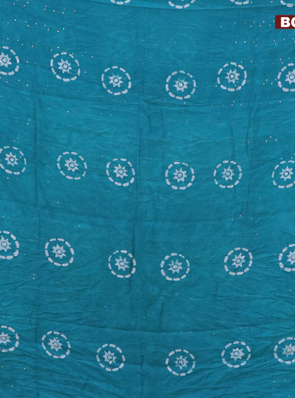 Batik cotton saree teal blue with allover sequin work & batik butta prints and printed lace work border