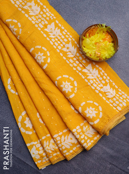 Batik cotton saree mustard yellow with allover sequin work & batik butta prints and printed lace work border