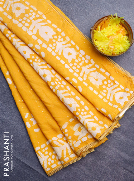 Batik cotton saree yellow with allover sequin work & batik butta prints and printed lace work border