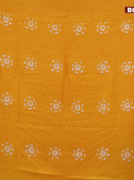 Batik cotton saree yellow with allover sequin work & batik butta prints and printed lace work border