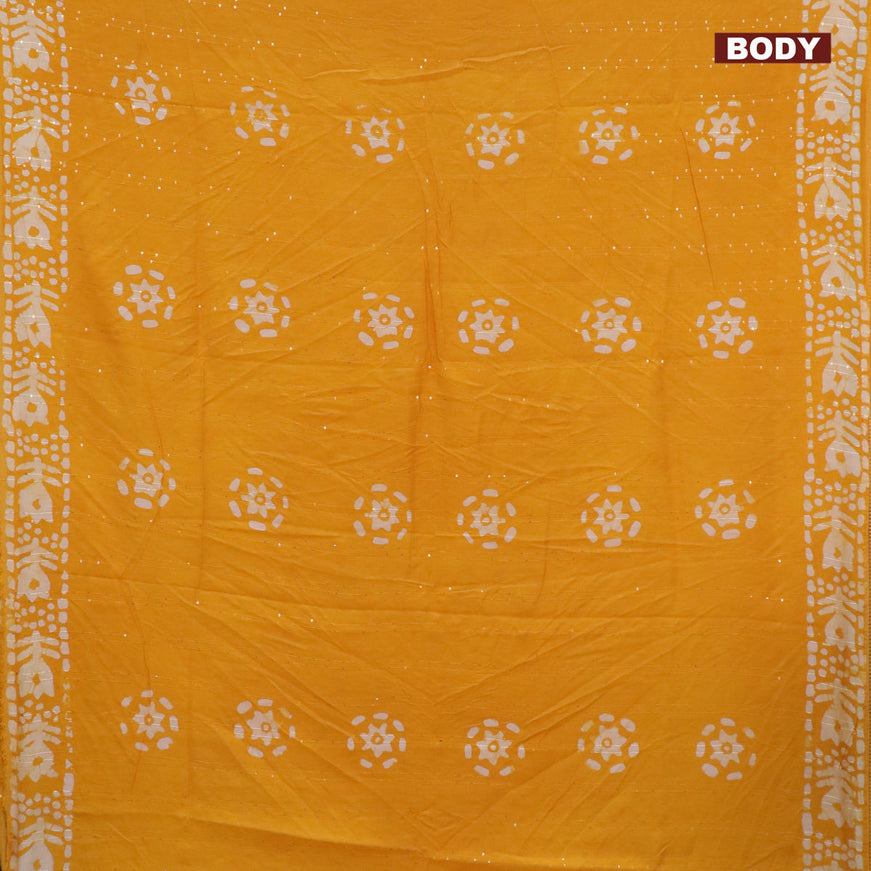 Batik cotton saree yellow with allover sequin work & batik butta prints and printed lace work border