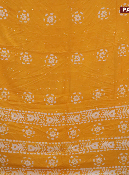 Batik cotton saree yellow with allover sequin work & batik butta prints and printed lace work border