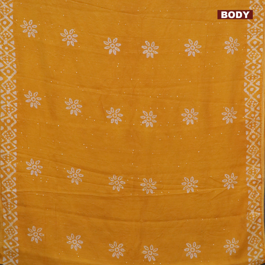 Batik cotton saree yellow with allover sequin work & batik butta prints and printed lace work border 4damage