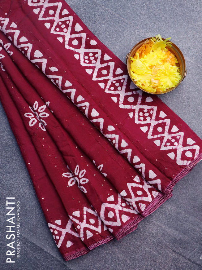 Batik cotton saree wine shade with allover sequin work & batik butta prints and printed lace work border