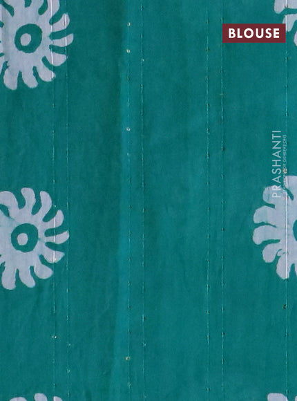 Batik cotton saree teal blue with allover sequin work & batik butta prints and printed lace work border