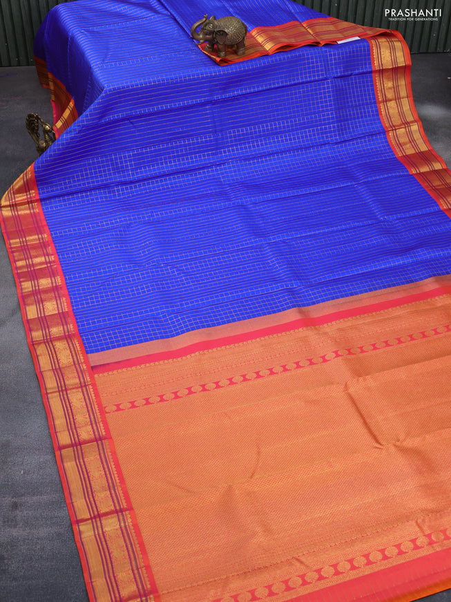 Pure kanchipuram silk saree blue and orange with allover zari checked pattern and rich zari woven korvai border