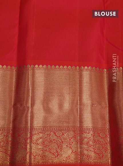 Pure kanchipuram silk saree cream and orange with allover zari woven butta weaves and long rich zari woven korvai border